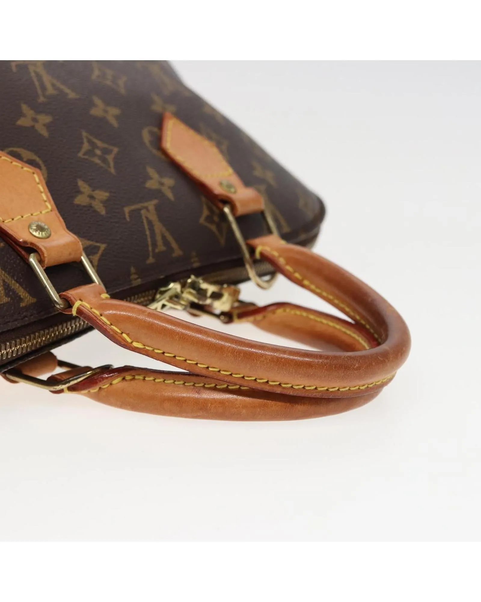 Monogram Canvas Alma Hand Bag with Top Handle